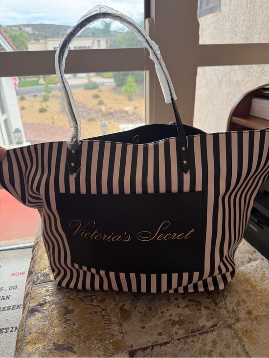 Victoria's Secret Handbags - NWT Victoria's Secret Black and White Striped Tote with Gold Logo